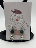 Boucles d'oreilles pieuvre/perle en verre verte